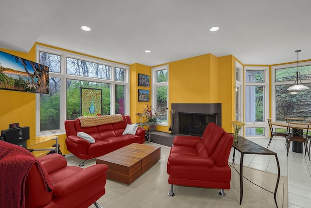 6730 Dublin Rd, Dublin, OH 43017 - tiled living room featuring a fireplace and expansive windows