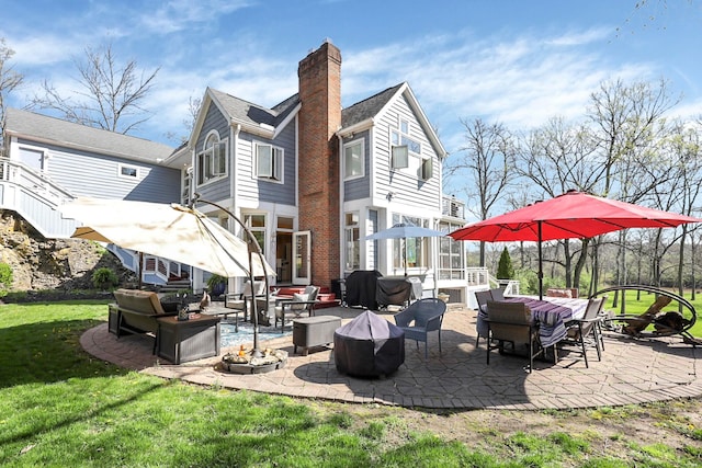 6730 Dublin Rd, Dublin, OH 43017 - rear view of house with a lawn, outdoor lounge area, and a patio area
