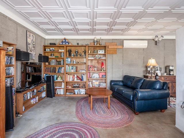 living room with concrete flooring and a wall mounted air conditioner