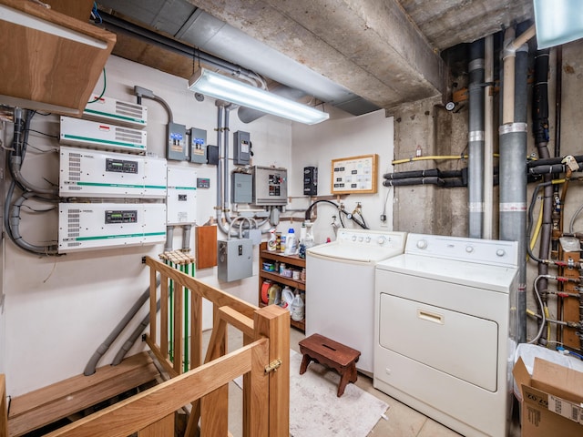 laundry room featuring separate washer and dryer