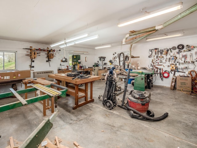 garage with a workshop area