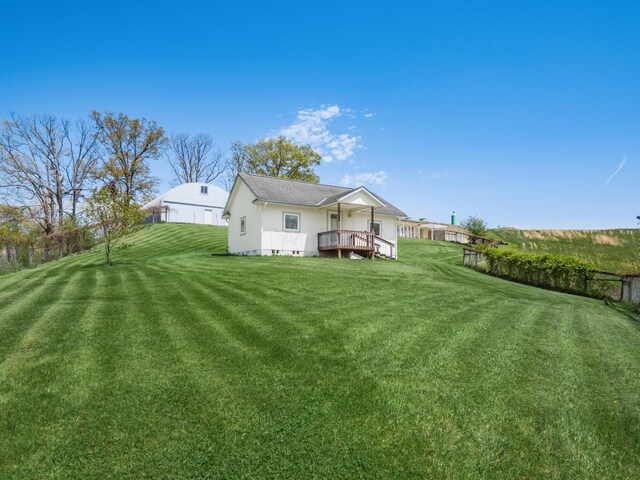 view of yard with a deck