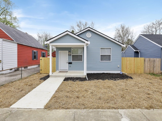 bungalow-style house featuring covered porch