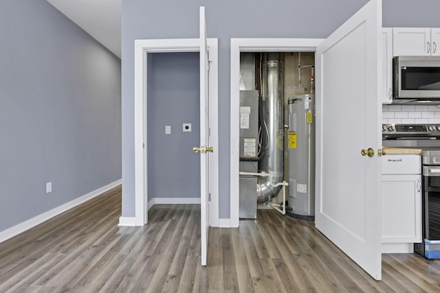 utility room with water heater