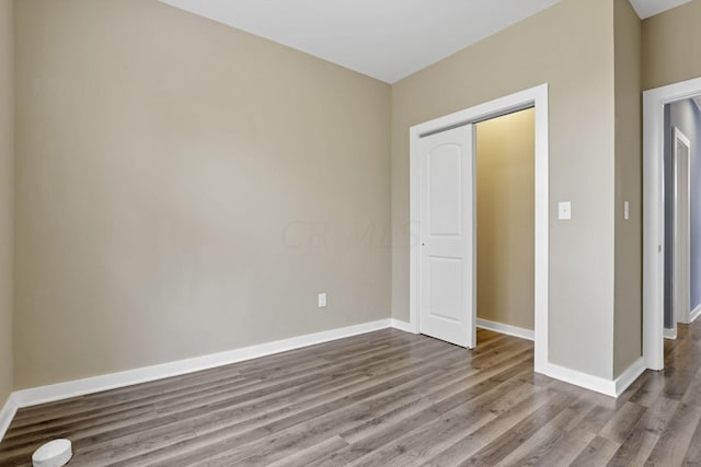 unfurnished bedroom featuring light wood-type flooring