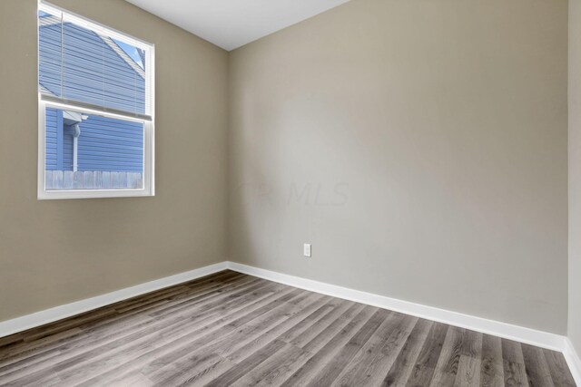 unfurnished room featuring light hardwood / wood-style flooring