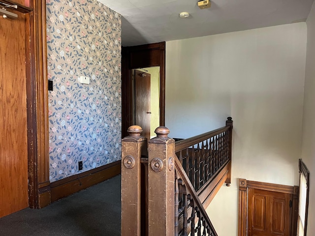 stairway with carpet floors