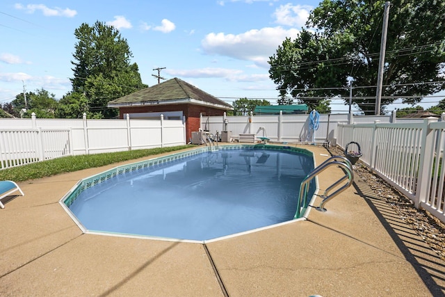 view of pool featuring a patio