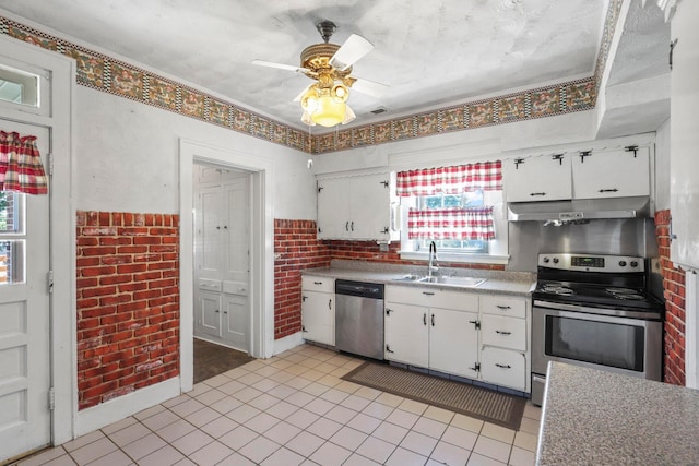 kitchen with white cabinets, a healthy amount of sunlight, and appliances with stainless steel finishes