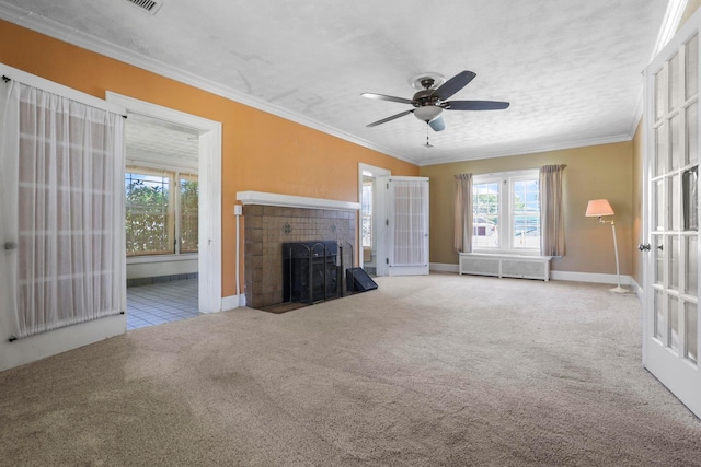 unfurnished living room with plenty of natural light, crown molding, and light carpet