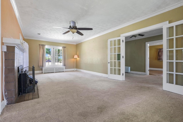 unfurnished living room featuring carpet flooring, french doors, radiator heating unit, and ornamental molding