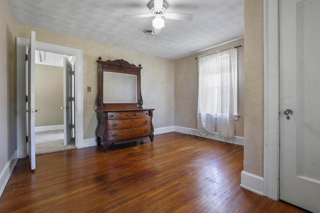 bedroom featuring ceiling fan and dark hardwood / wood-style flooring