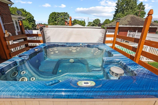 exterior space featuring a hot tub