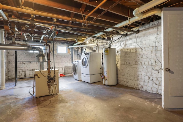 basement featuring separate washer and dryer and gas water heater