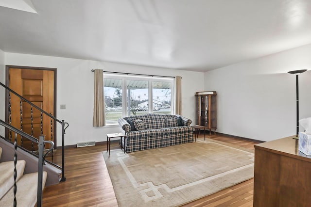 living room with wood-type flooring