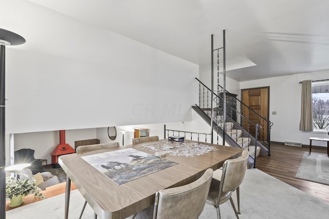 dining area with wood-type flooring