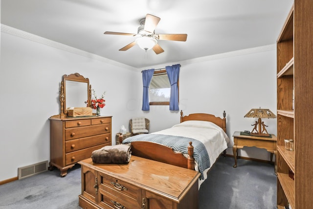 bedroom featuring carpet flooring, ceiling fan, and ornamental molding