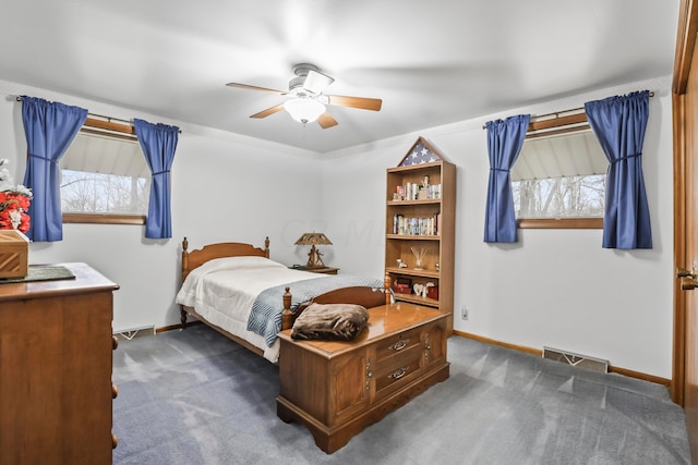 carpeted bedroom with ceiling fan