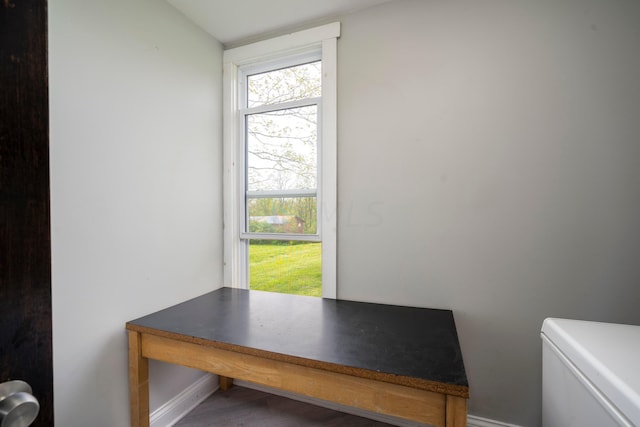 office space with wood-type flooring