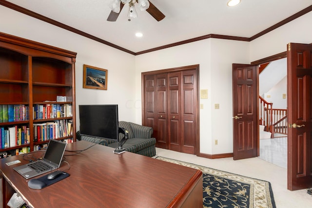 office area with light colored carpet, ceiling fan, and crown molding