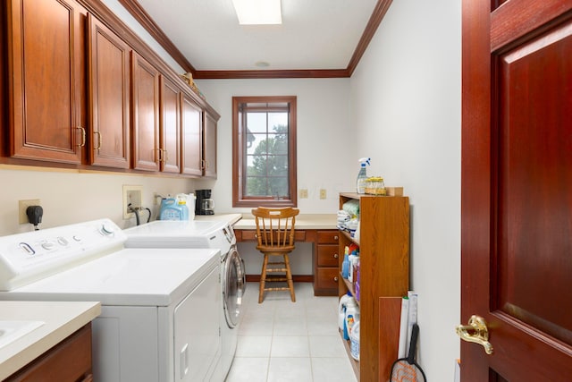 clothes washing area featuring cabinets, independent washer and dryer, light tile patterned floors, and ornamental molding