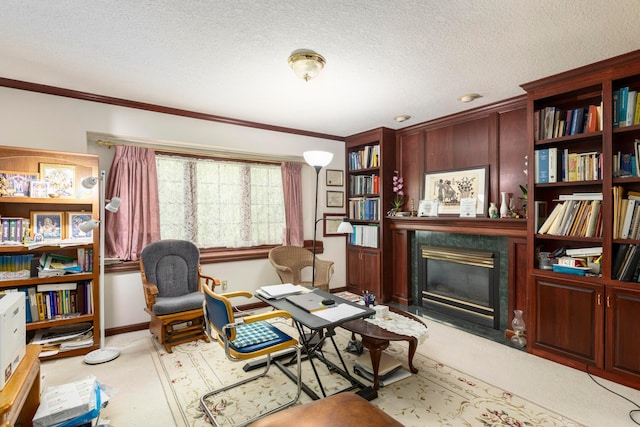 sitting room with a textured ceiling, crown molding, and light carpet