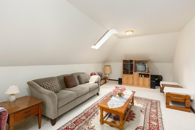 living room with lofted ceiling with skylight and light carpet