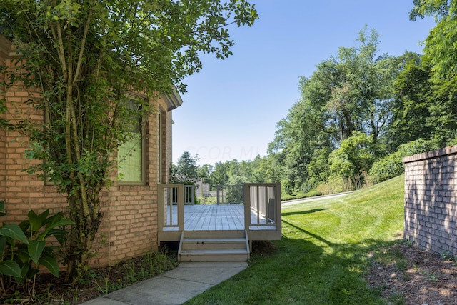 view of yard with a wooden deck