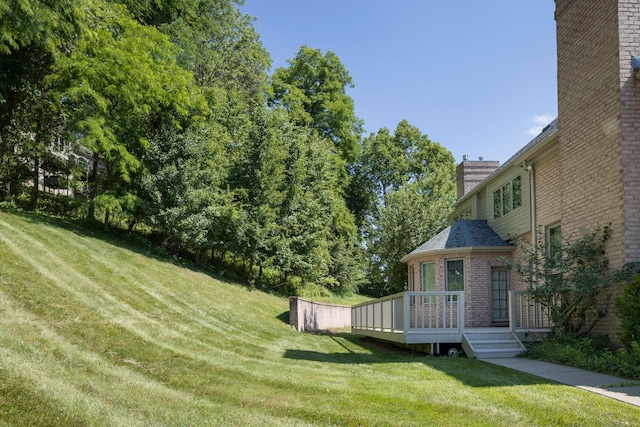 view of yard with a deck