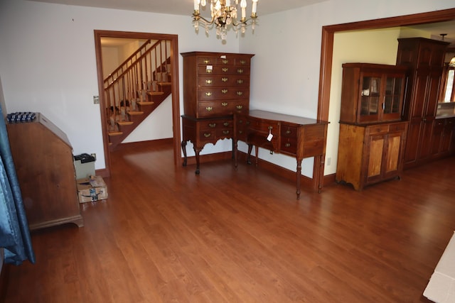 dining room featuring a notable chandelier and wood-type flooring