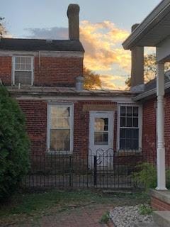 view of property exterior at dusk