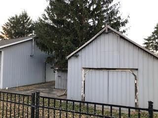 view of outbuilding with a garage