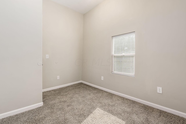 unfurnished room featuring carpet flooring