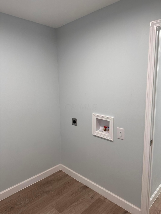 washroom featuring hookup for an electric dryer, hookup for a washing machine, and dark hardwood / wood-style floors