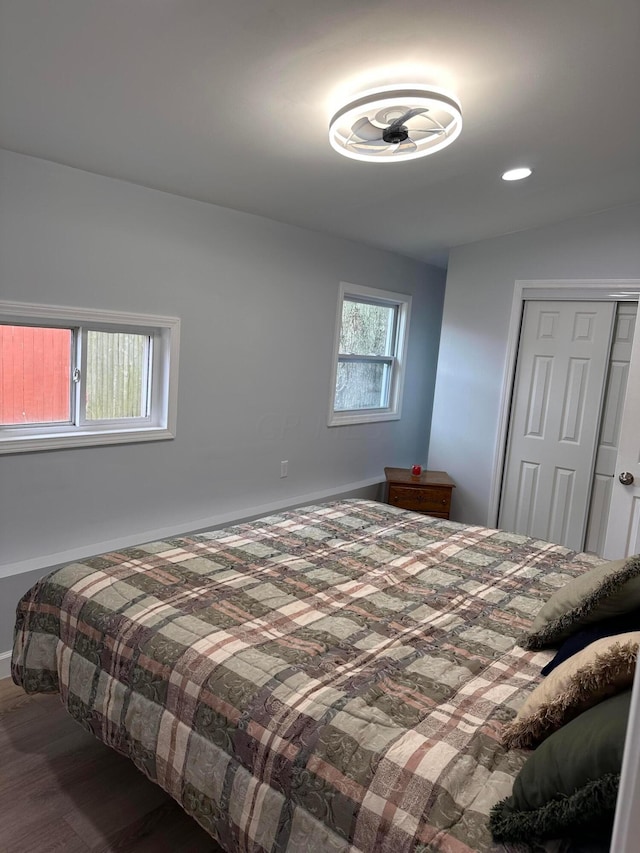 bedroom with hardwood / wood-style floors