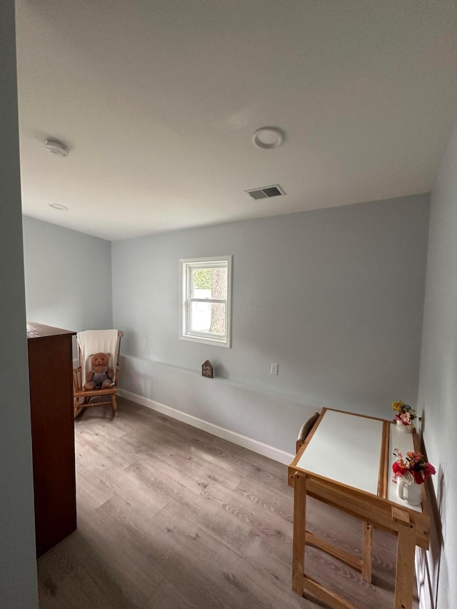 interior space with hardwood / wood-style flooring