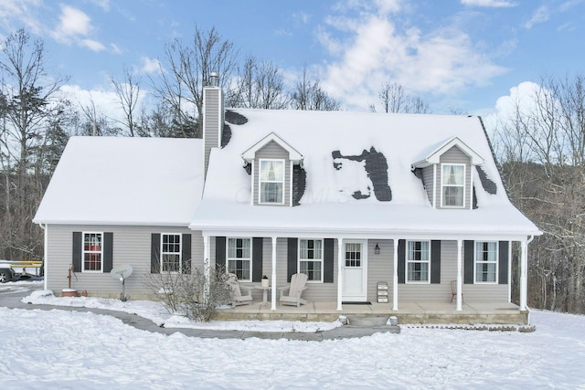 cape cod home featuring a porch