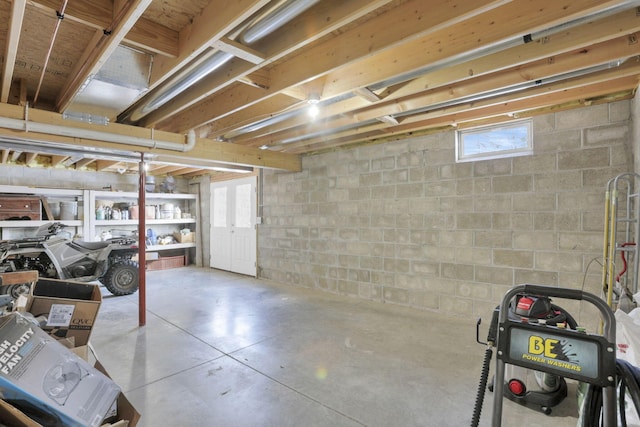 basement featuring plenty of natural light