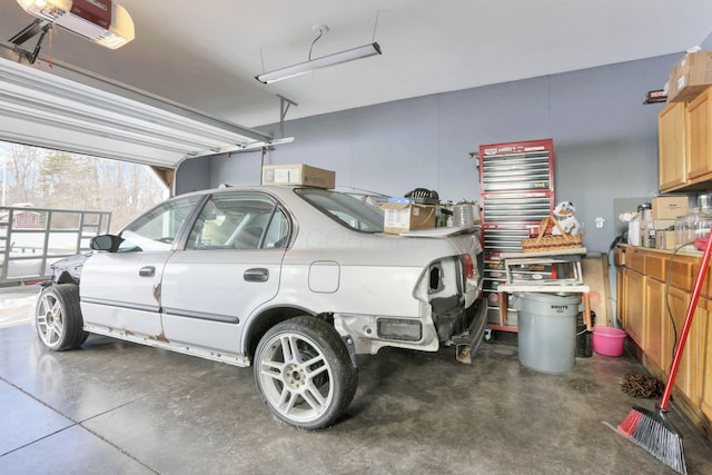 garage featuring a garage door opener