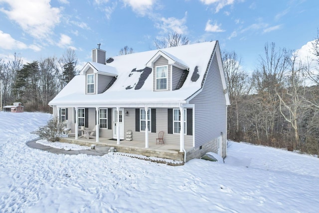 new england style home featuring covered porch