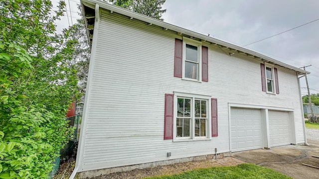 view of home's exterior with a garage