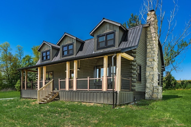 view of front of property featuring a front lawn and covered porch