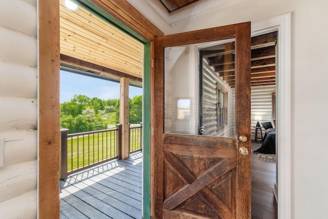 entryway with wood-type flooring