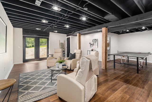 living room featuring french doors and dark hardwood / wood-style floors