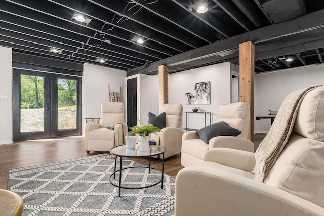 living room with wood-type flooring and french doors