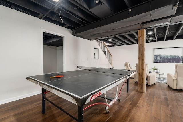 recreation room featuring dark hardwood / wood-style floors