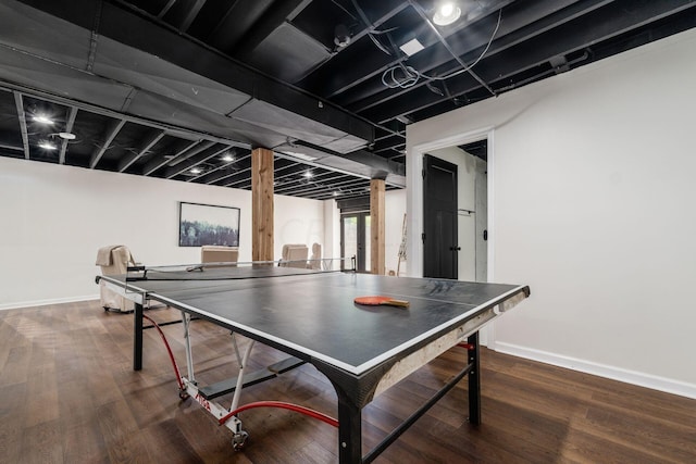 recreation room featuring dark hardwood / wood-style floors