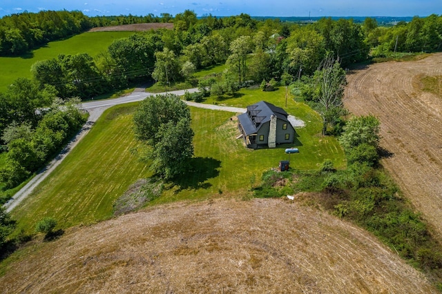 birds eye view of property featuring a rural view