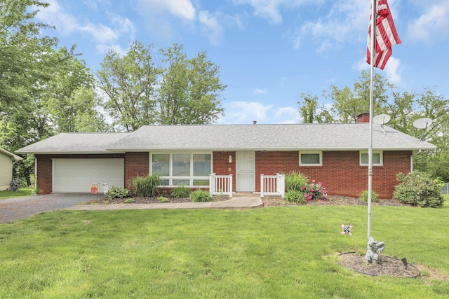 single story home with a front lawn and a garage