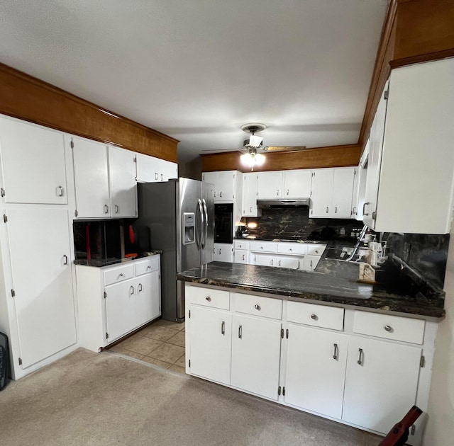 kitchen with white cabinets, ceiling fan, and stainless steel fridge with ice dispenser